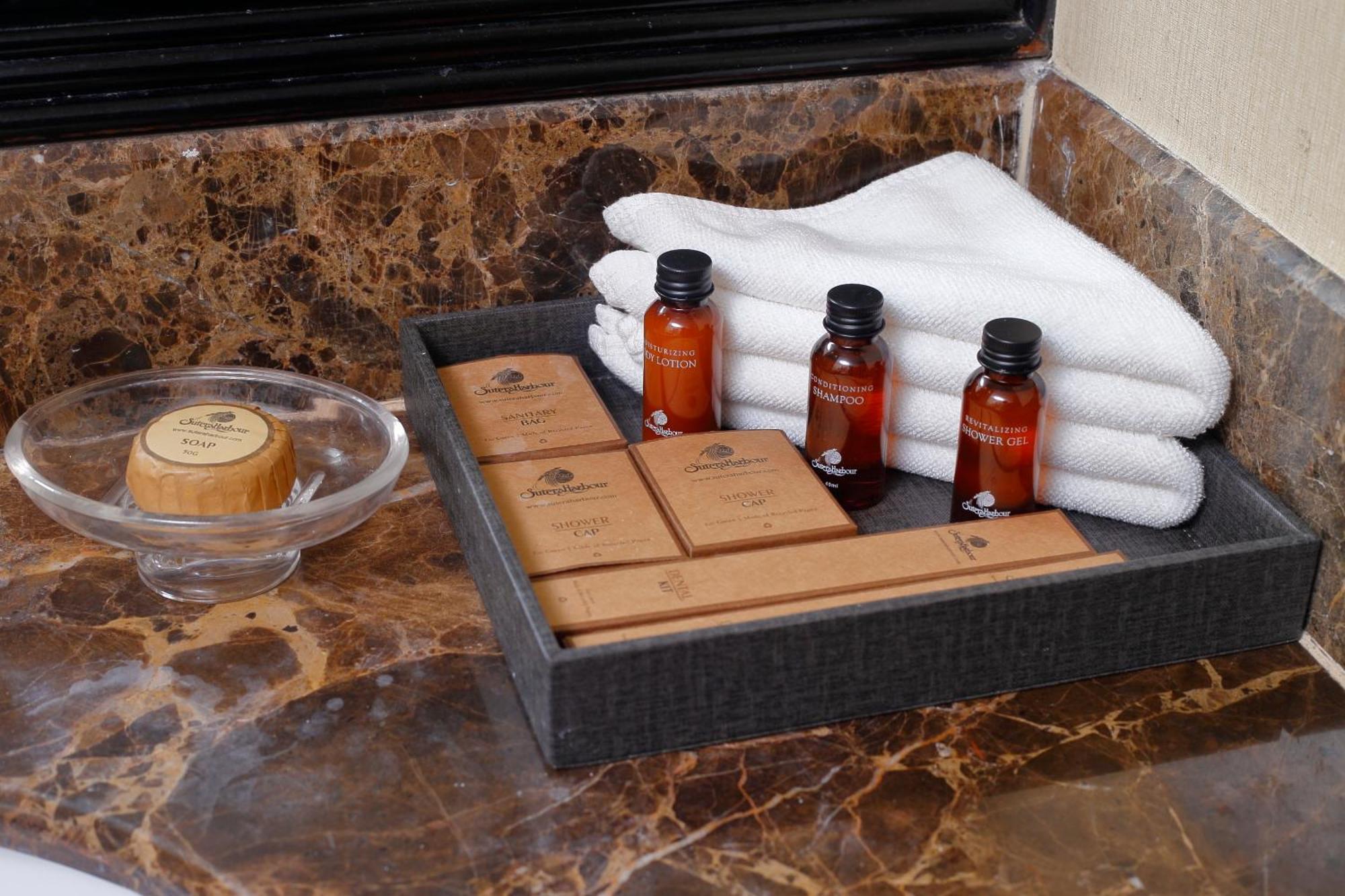 The Pacific Sutera Otel Kota Kinabalu Dış mekan fotoğraf A selection of toiletries in a hotel bathroom